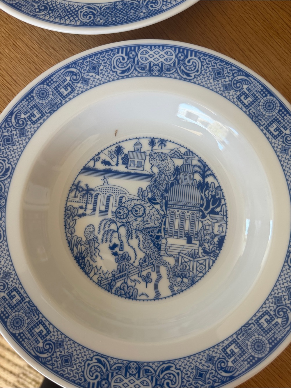 Set of 4 Blue & White Ceramic Soup Bowls with Whimsical Designs - Picture 8 of 13